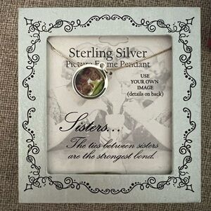 Sisters Picture Frame Pendant, sterling silver with chain, new in box.